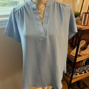 Entro Light Blue V neck high low top